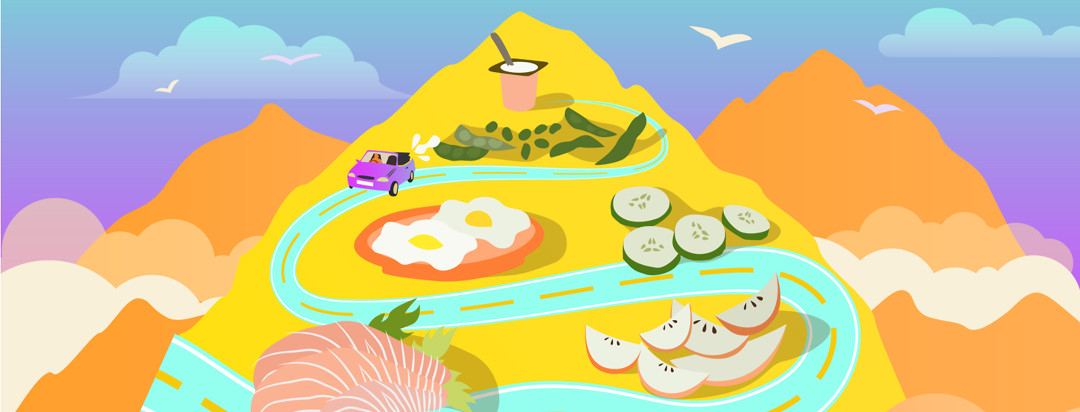 Mountains and clouds are featured; the central mountain shows giant food items like apple slices, sashimi, edamame, cucumbers, yogurt, and eggs as a car travels through the road of food.