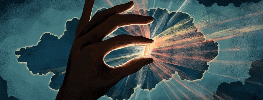 A hand in shadow handles up a pill that is illuminated from behind, emitting rays of light. This is set against a dark sky with a cloud also somewhat illuminated from behind.