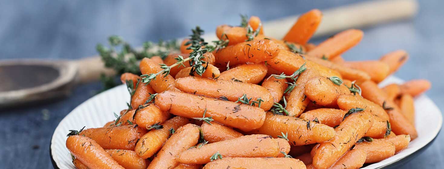 Plate of steamed carrots.