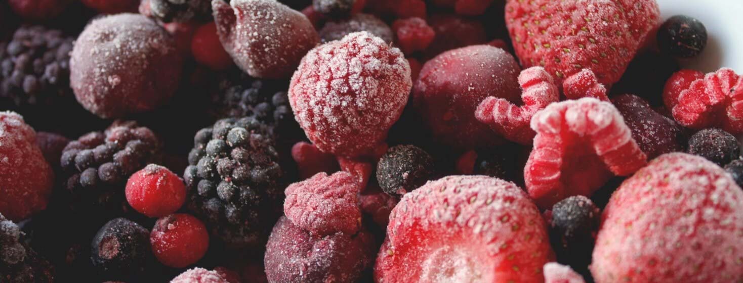 A medley of frozen strawberries, blueberries, and raspberries.