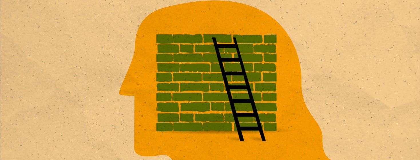 a ladder leaning against a brick wall in a head
