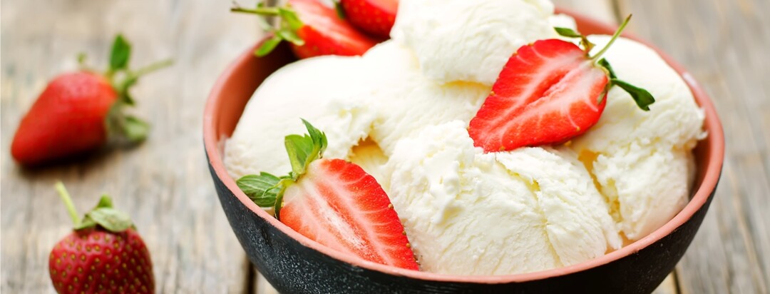 Sugar free yogurt garnished with strawberries.