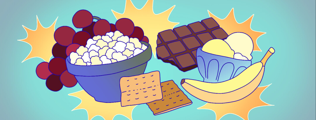 A collection of diabetes-friendly sweet snacks. Banana ice cream, dark chocolate, graham crackers, grapes, popcorn.