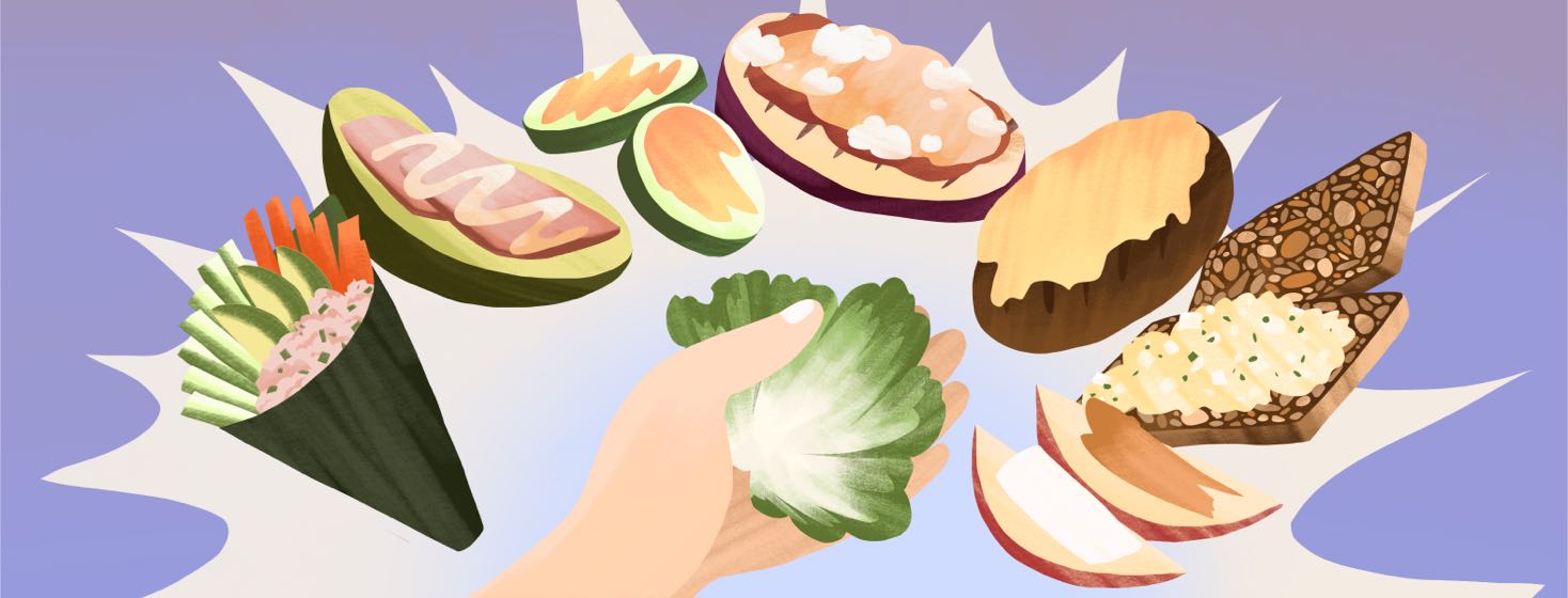 A hand holds a lettuce leaf, surrounded by other low-carb bread substitutions for wraps and sandwiches like seaweed sheets, pickles, cucumbers, grilled eggplant, grilled mushroom, seed bread and apple slices.