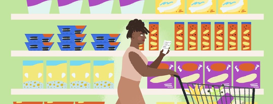 A woman is grocery shopping with a list